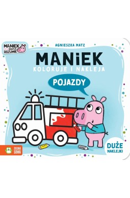 Maniek koloruje i nakleja. Pojazdy